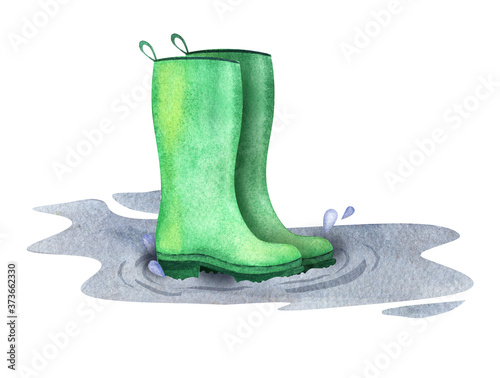 Watercolor image of green rubber boots standing among fall puddle on white background. Hand drawn autumn illustration of waterproof rainboots on rough ribbed sole
