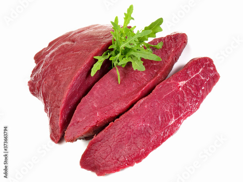 Raw Ostrich Steaks - Wild Game Meat on white Background - Isolated