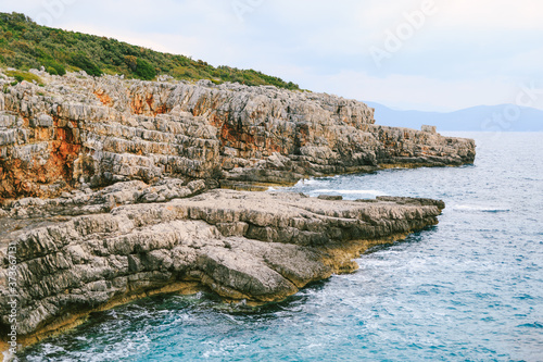 Rocky coast with azure blue water.