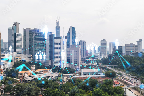 Photography Social media icons hologram over panorama city view of Kuala Lumpur, Malaysia, Asia