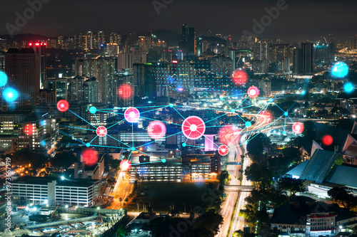 Photography Abstract technology icons, night aerial panoramic cityscape of Kuala Lumpur, Malaysia, Asia