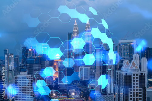 Photography Abstract technology icons, night aerial panoramic cityscape of Kuala Lumpur, Malaysia, Asia