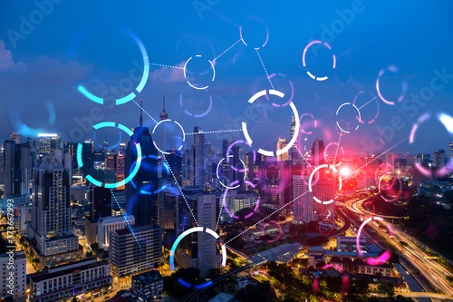 Canvas Print Abstract technology icons, night aerial panoramic cityscape of Kuala Lumpur, Malaysia, Asia