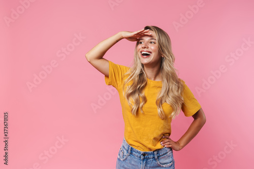 Positive young woman looking aside