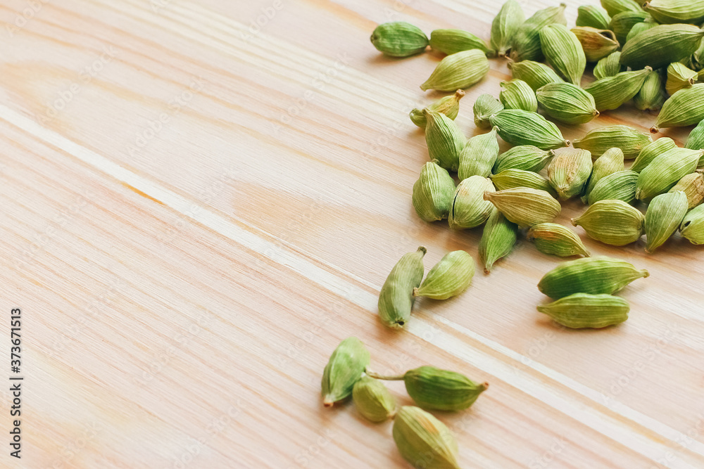 cardamom on a wooden white table
cardamom on a wooden white table
