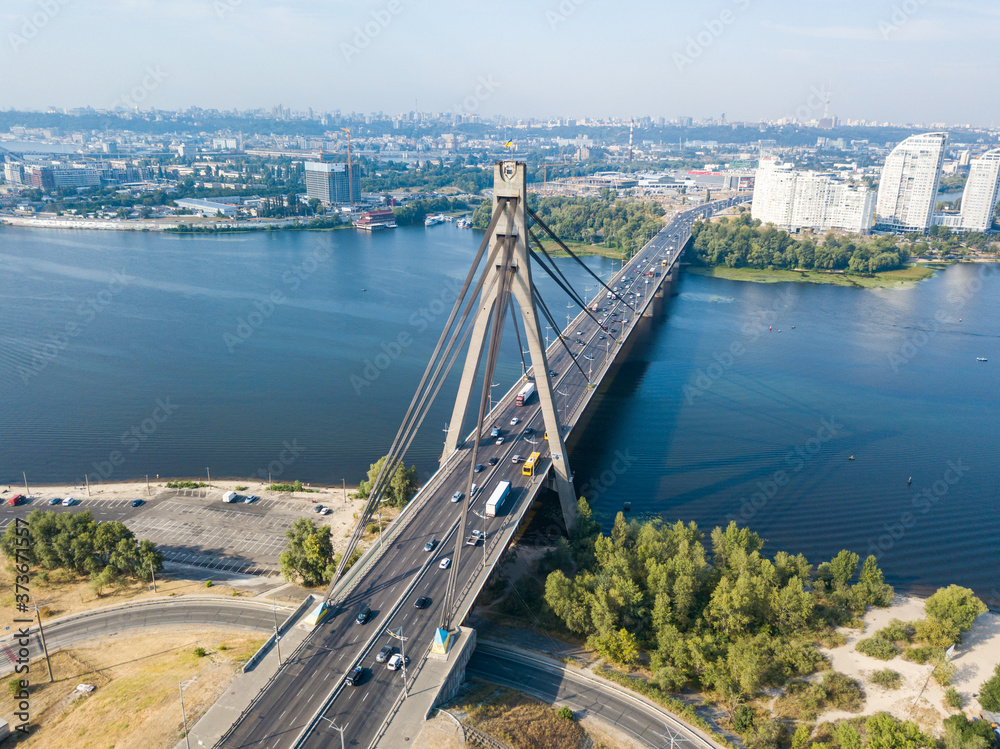 Aerial drone view. North bridge in Kiev and the Dnieper river on a clear summer morning.