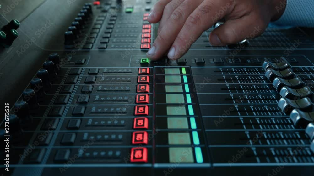 Sound Engineer Moving Sliders In Radio Station. Sound Designer Used