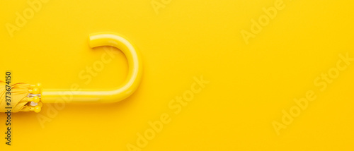 folded yellow umbrella photo
