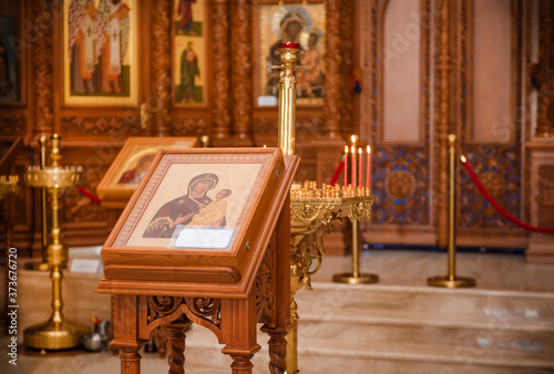 Orthodox Church, icon of the mother of God with a child, candles, altar
