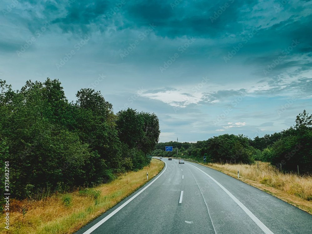 Fototapeta premium Asphalt road and beautiful nature landscape