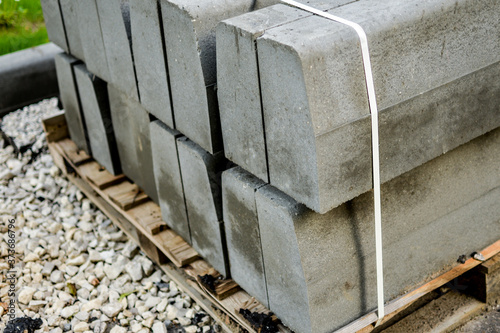concrete gray modules on wooden pallets. Construction Materials