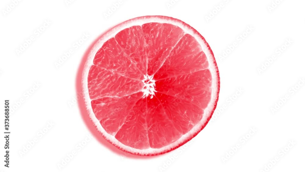 Rotating bright red and pink citrus fruit slice cut animation. White background. Grapefruit. Rotating bright red and pink citrus fruit slice cut animation. White background. Grapefruit.