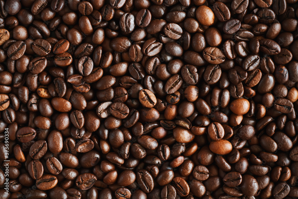 The background is made of high-quality natural aromatic roasted coffee beans, which will be ground and become a delicious coffee drink. The background is made of high-quality natural aromatic roasted coffee beans, which will be ground and become a delicious coffee drink.