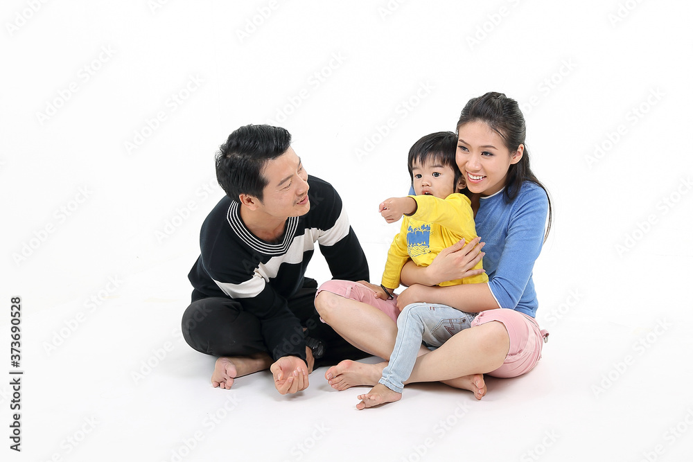 South East Asian Chinese couple husband wife son child play sit on floor show point white background love South East Asian Chinese couple husband wife son child play sit on floor show point white background love