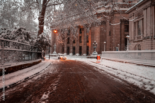 London, England - February 02, 2009: Snow covered road in Trinity Square photo