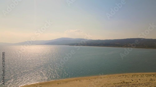 4K aerial drone clip flying backwards over the beach near Strymonas river in Macedonia, Greece