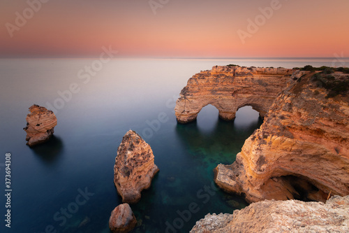 Praia da Marinha cove with the famous heart formation of the natural archs at Algarve, Portugal.