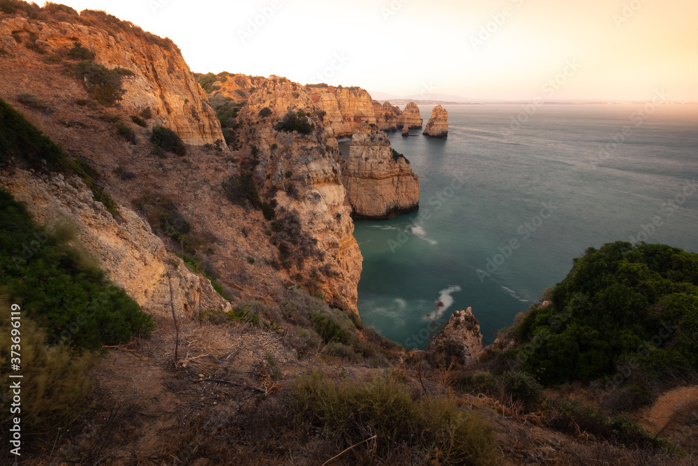 Coves and cliffs at Ponta da Piedade the most famous spot of Algarve region, in Portugal.