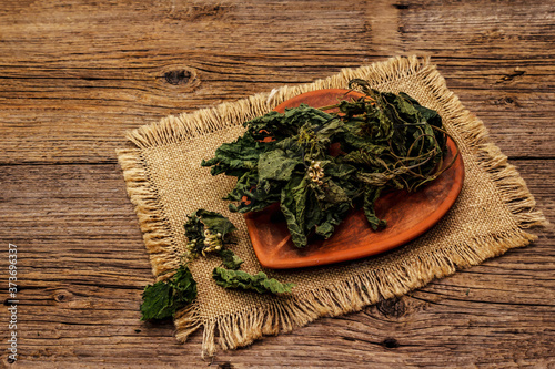 Dry leaves and flowers of nettle for cooking healthy herbal tea