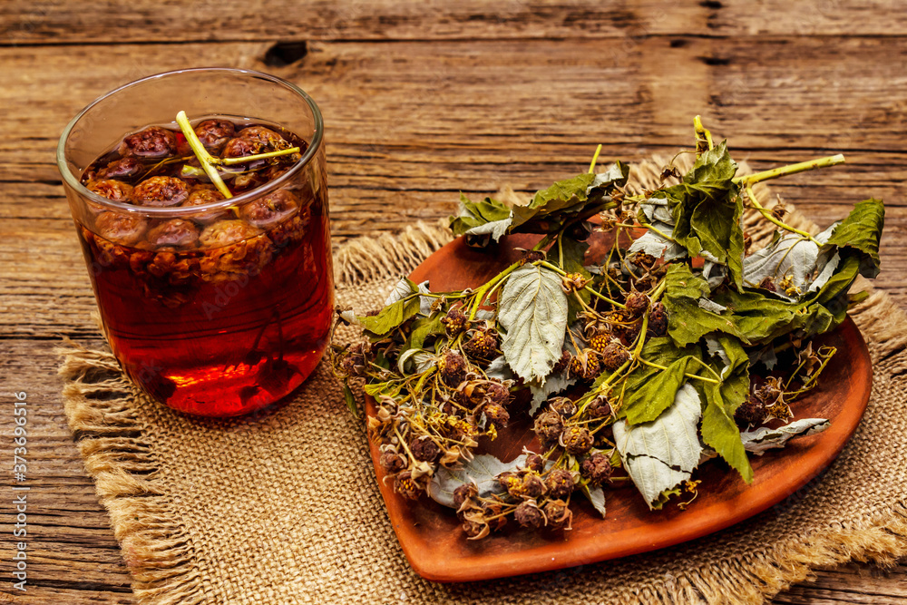 Dry leaves, flowers and berries of raspberry for cooking healthy herbal tea Dry leaves, flowers and berries of raspberry for cooking healthy herbal tea
