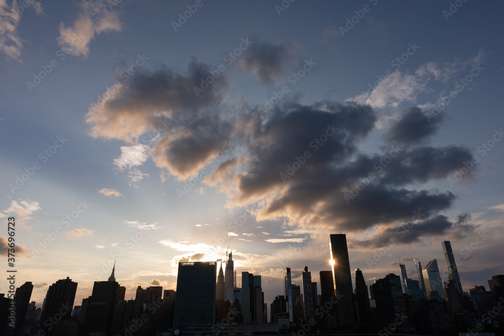 Beautiful Silhouettes of Skyscrapers in the Midtown Manhattan Skyline during a Sunset in New York City