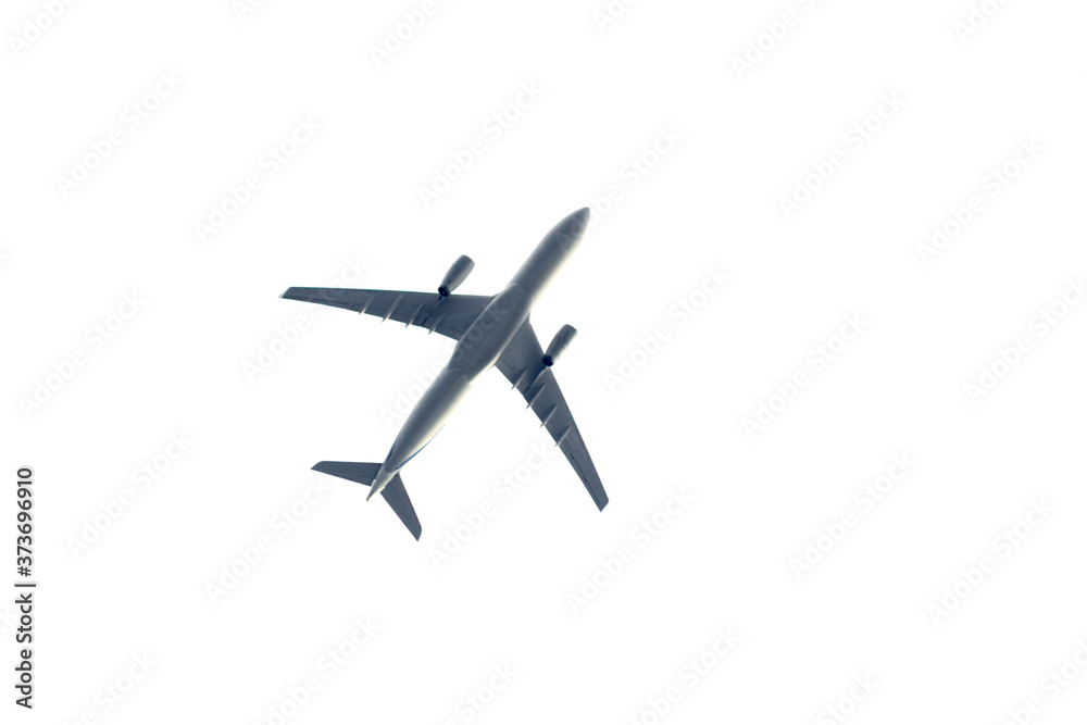the big plane flies among the clouds against the sky. The concept of ending the coronavirus pandemic and increasing air travel. isolated on white background airplane.