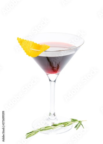 Glass of tea with lemon zest and cinnamon stick isolated on white background. Drinks menu concept