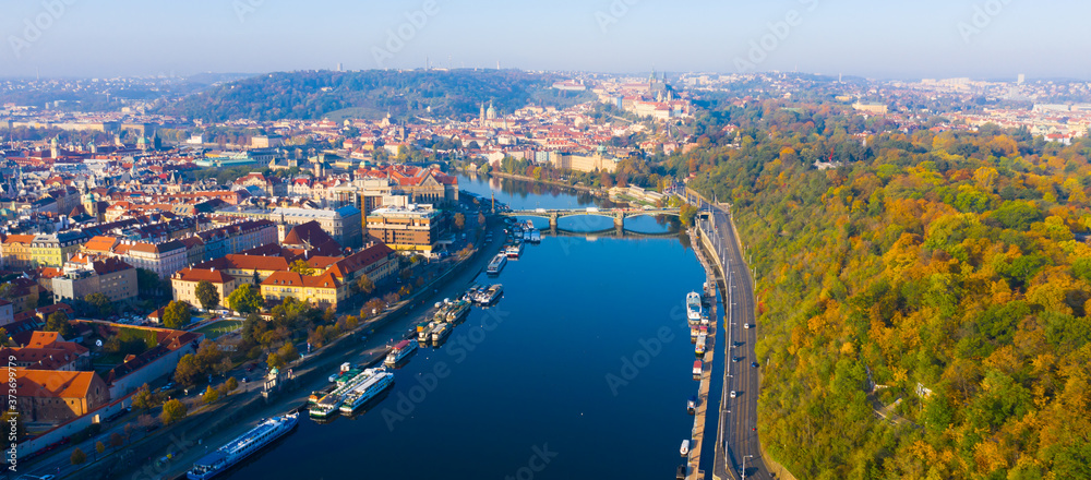 Picturesque view from drone of Prague on banks on Vltava river, capital and largest city of Czech Republic on fall day