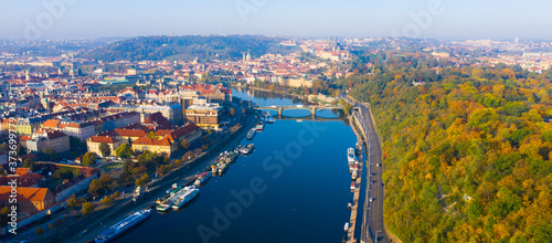 Picturesque view from drone of Prague on banks on Vltava river, capital and largest city of Czech Republic on fall day