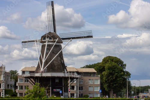 Architecture old replaced by new. Winmill in Ommen Netherlands photo