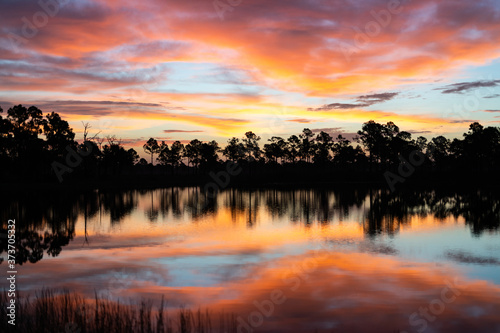Florida Babcock Webb Wildlife Management Area Sunsrise over the Lake photo