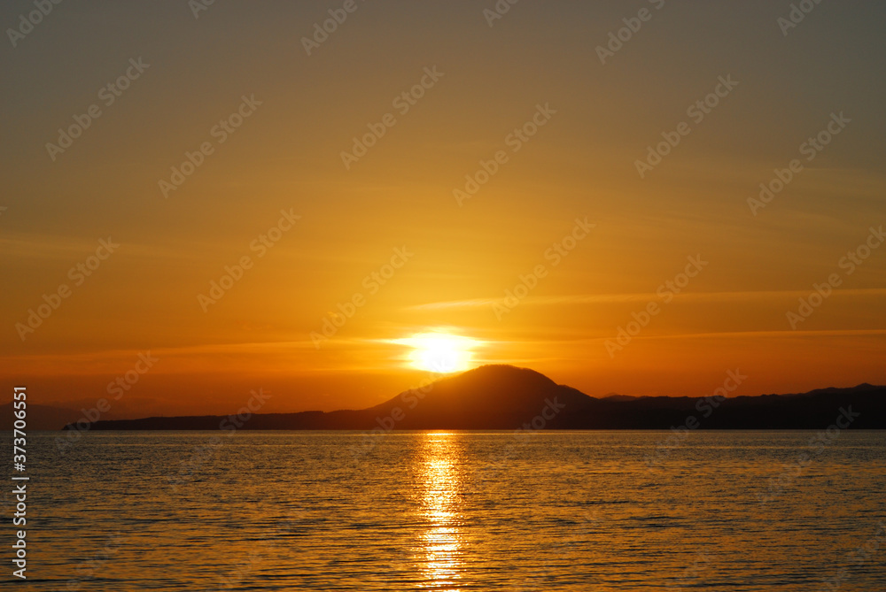 Obraz premium 夕暮れ 夕焼け 海 空 素材