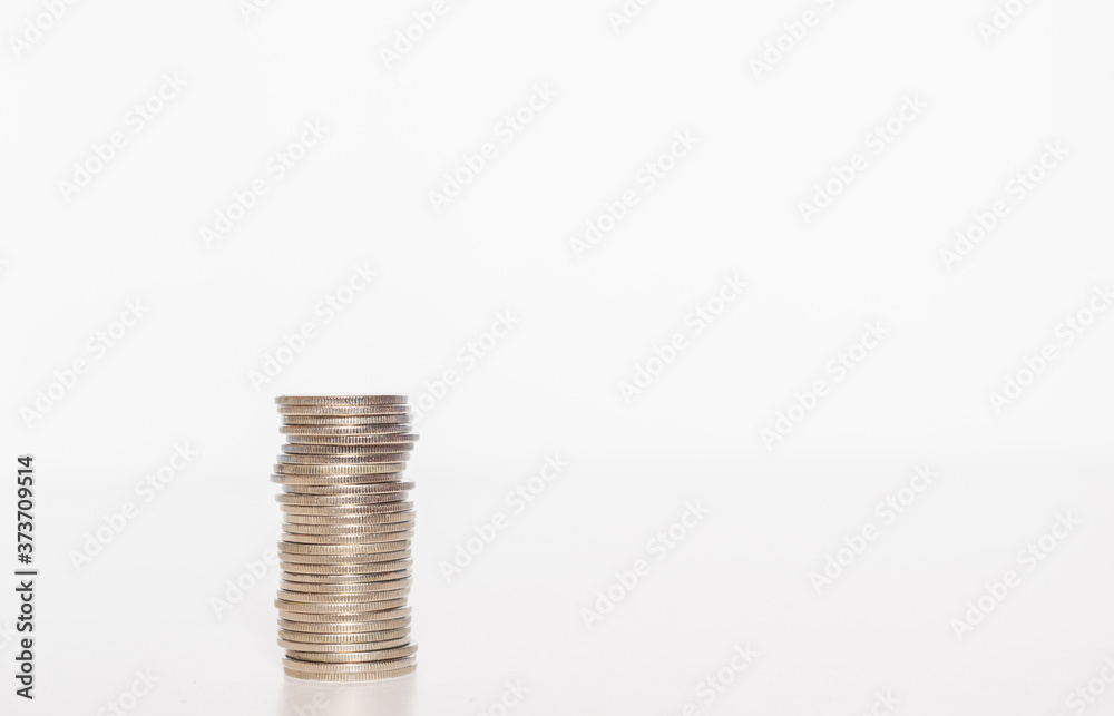 silver coin stack row growing pile on white background for money saving and investment business financial and banking concept. silver coin stack row growing pile on white background for money saving and investment business financial and banking concept.