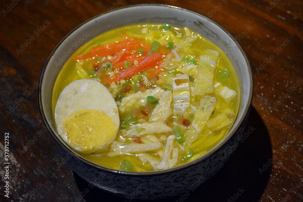 Lomi noodles with hot soup and egg food display