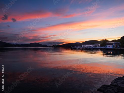 Summer sunset with view to Pyramidenkogel on Lake Woerther, Carinthia, Austria.