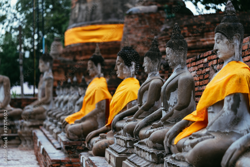 Many old Buddha statues in the ancient city of Ayutthaya, Thailand. Many old Buddha statues in the ancient city of Ayutthaya, Thailand.