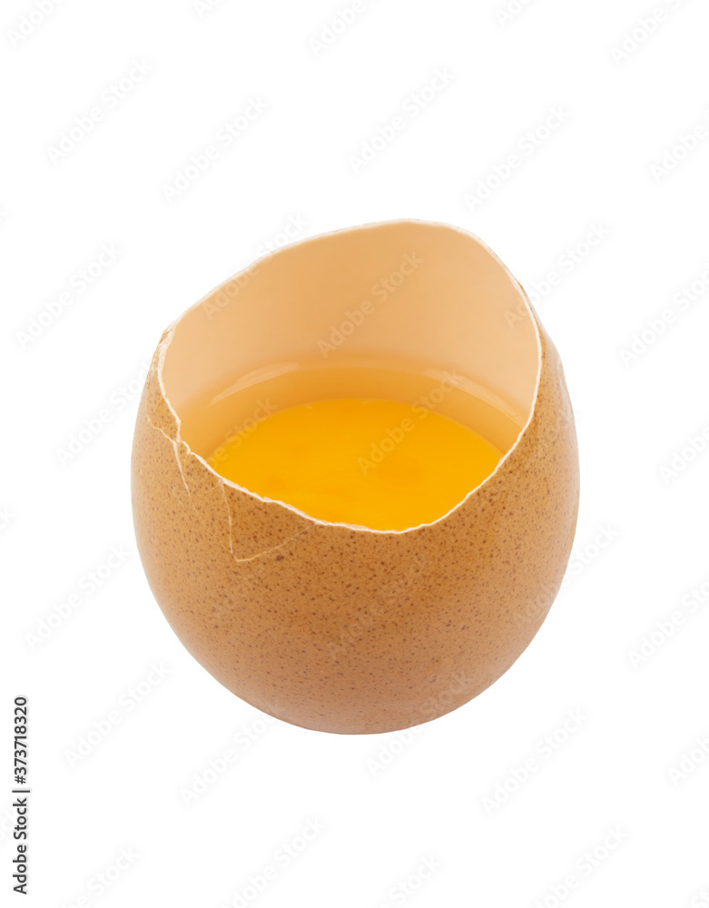 Egg shell with yolk isolated on white background