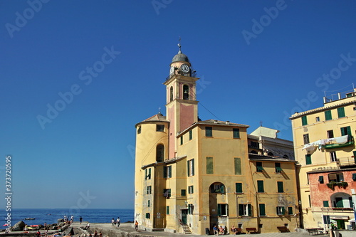 Basilica Di Santa Maria Assunta in Camogli, Italy anchors this Italian Riviera resort town. This historic landmark is popular with tourists traveling on vacation.