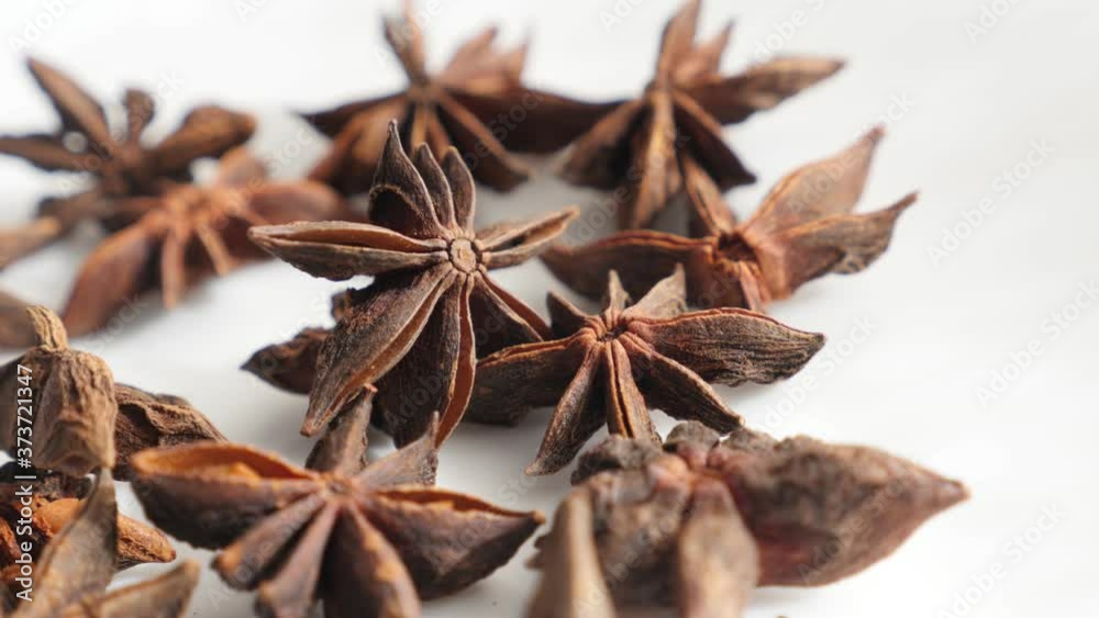 Slow panning over star anise Illicium verum close-up 4K footage Slow panning over star anise Illicium verum close-up 4K footage