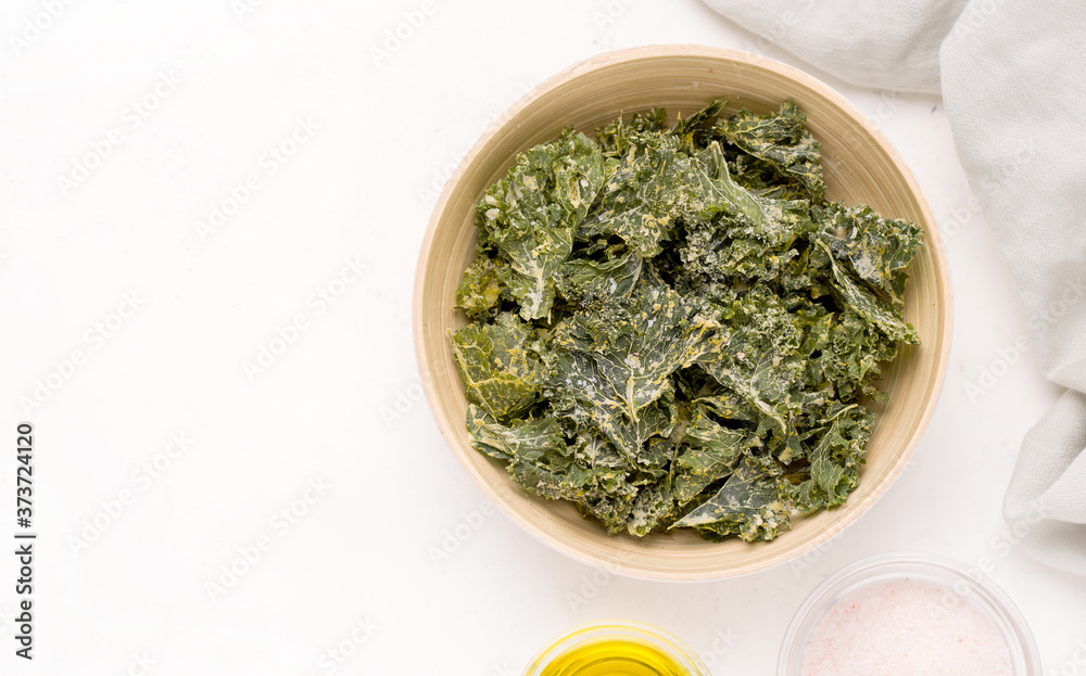 Kale chips on a white background. Copy space Kale chips on a white background. Copy space