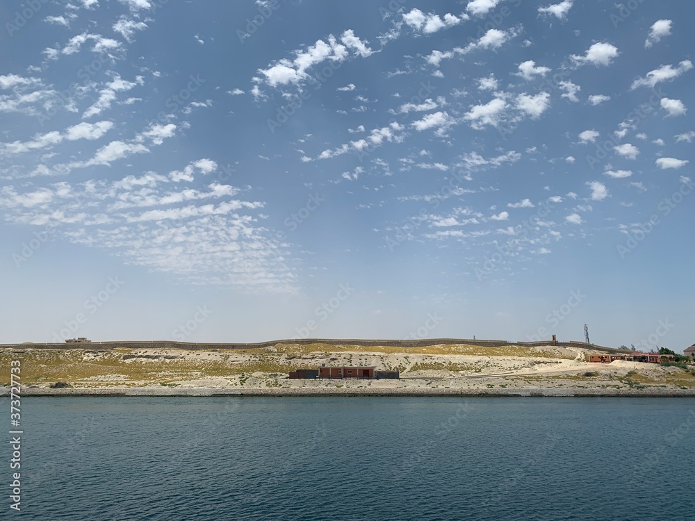 A small check-post under blue sky in Suez Canal.