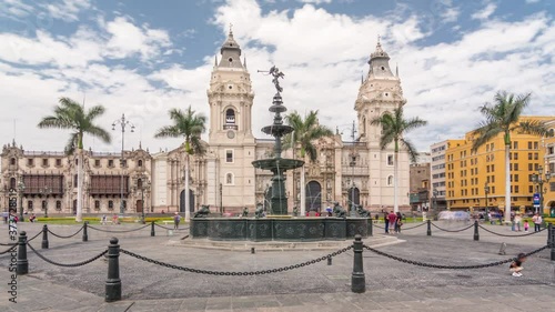 Fountain on The Plaza de Armas timelapse hyperlapse, also known as the Plaza Mayor, sits at the heart of Lima's historic center. Cathedral on a background photo