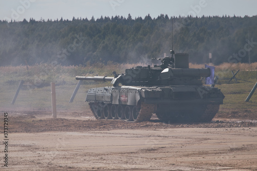 Modern tank at the tank biathlon competition in Alabino near Moscow during the Army-2020 forum photo