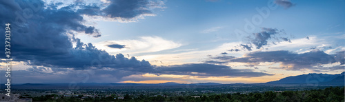 Εκτύπωση καμβά Panoramic sunset scene filled with blue skies and clouds in Taos, NM