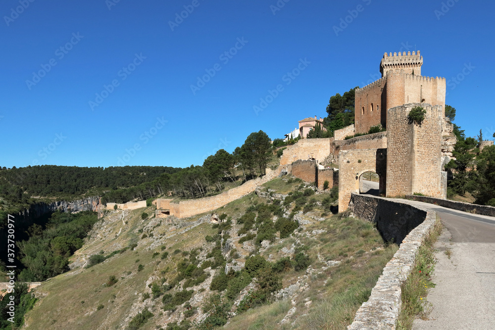 Alarcon, a fortified small town in the province of Cuenca, Castilia-La Mancha, Spain, in morning sunlight Alarcon, a fortified small town in the province of Cuenca, Castilia-La Mancha, Spain, in morning sunlight