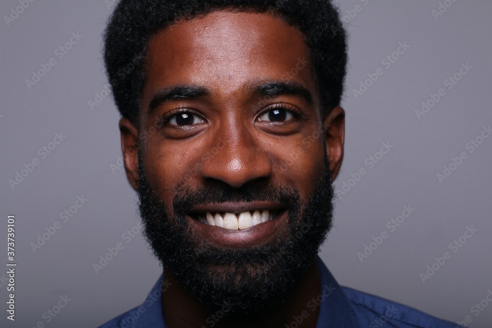 Beautiful afro man in front of a background Beautiful afro man in front of a background