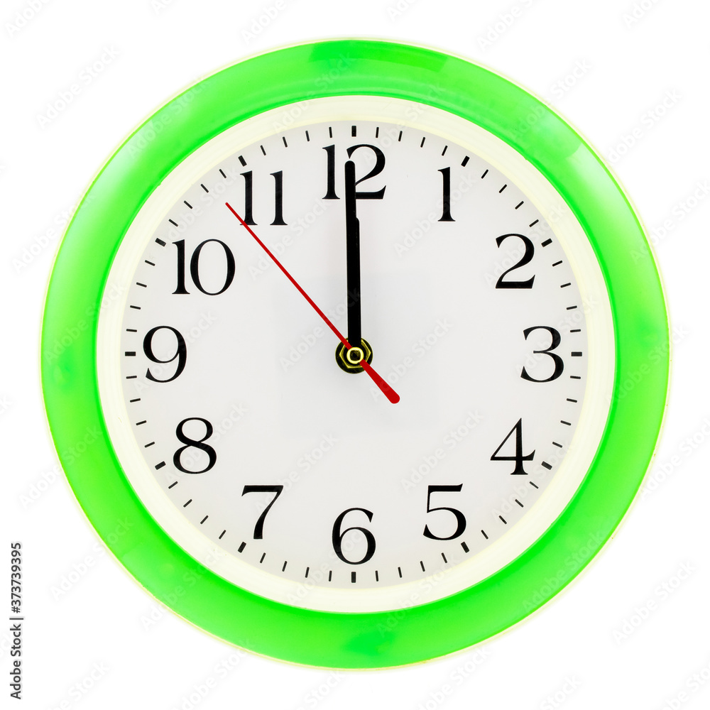 Green clock on white isolated background, which shows 12 hours. The New Year has come Green clock on white isolated background, which shows 12 hours. The New Year has come