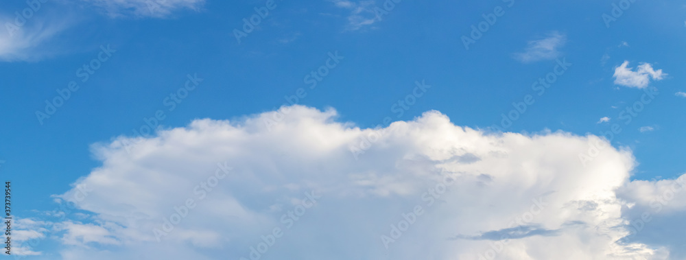 Panorama of the blue sky with an unusual oval cloud Panorama of the blue sky with an unusual oval cloud