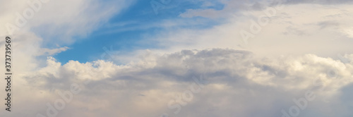Fototapeta Naklejka Na Ścianę i Meble -  Panorama of blue sky with white clouds in the evening