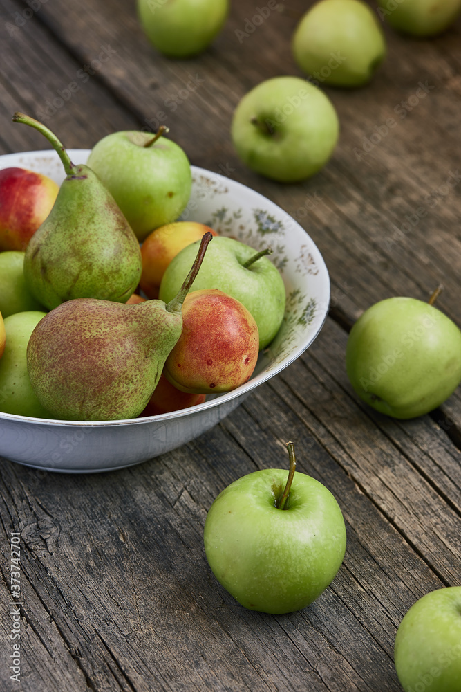 Appels and pears on a wooden background Appels and pears on a wooden background